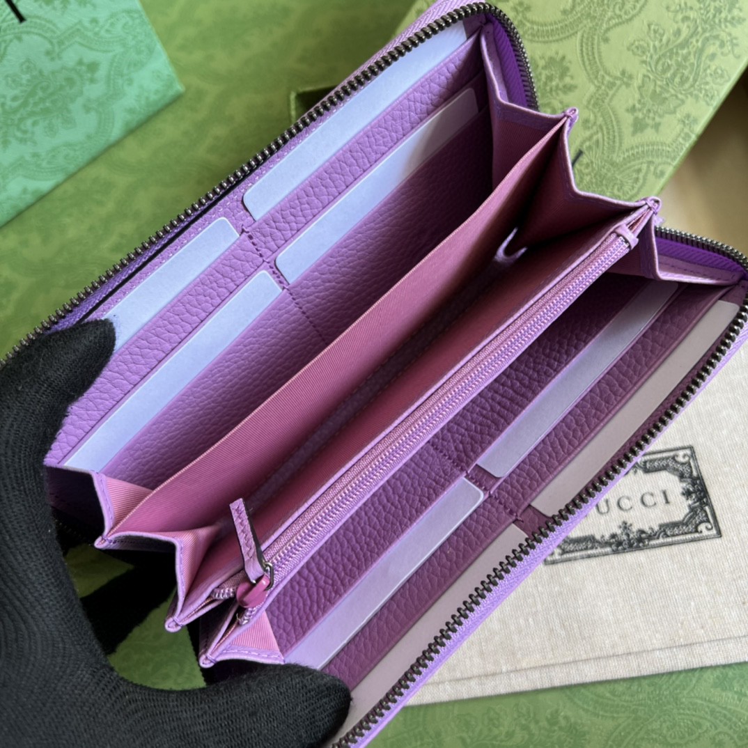 G*u*i leather zip around wallet
