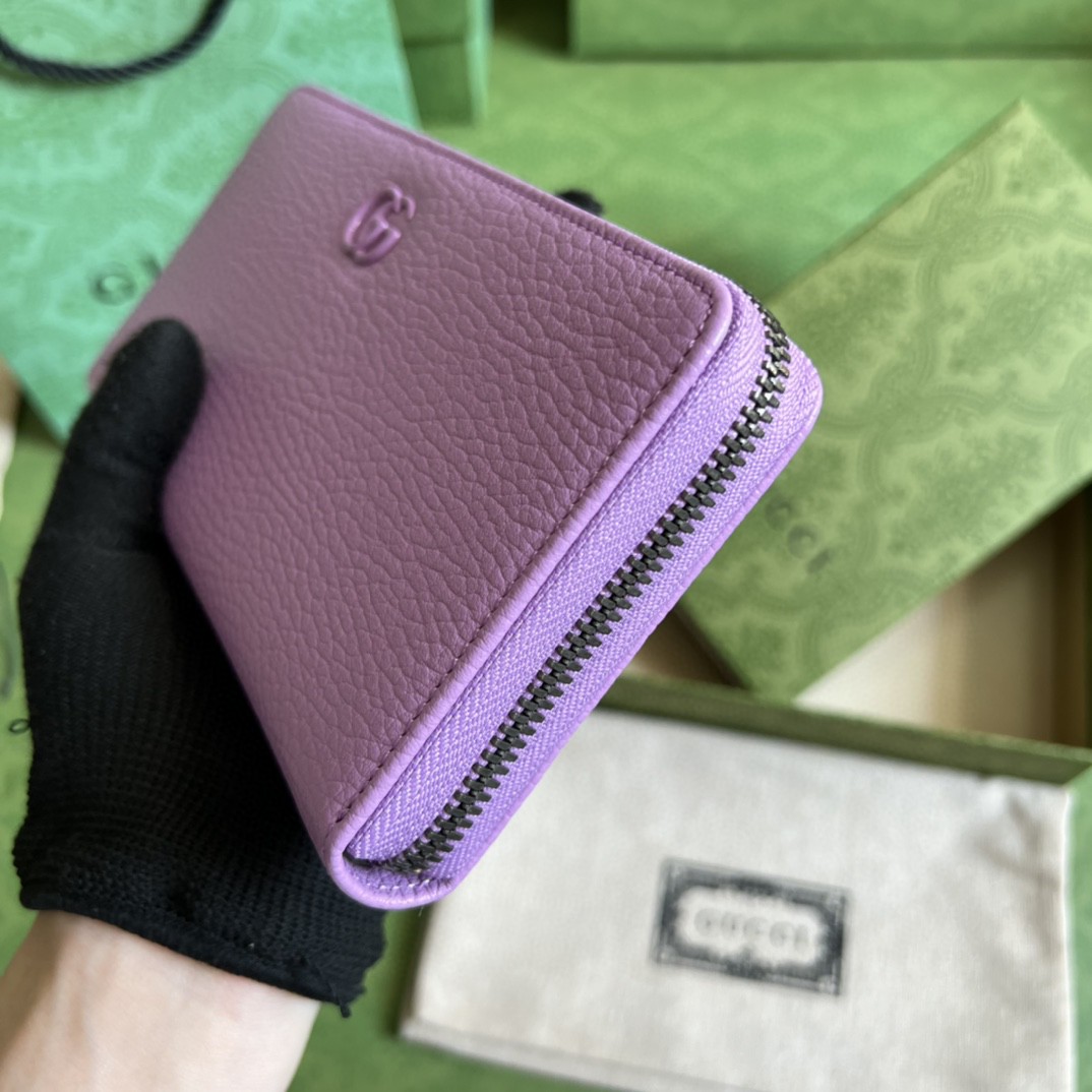 G*u*i leather zip around wallet