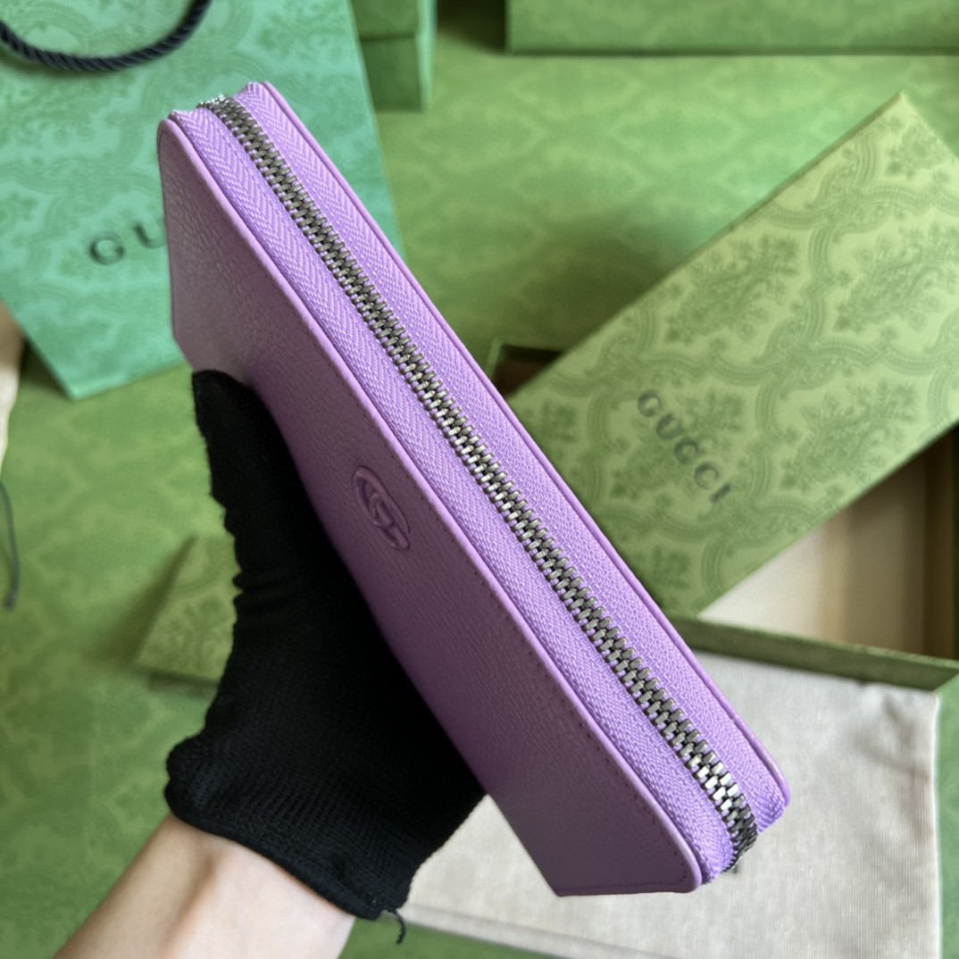 G*u*i leather zip around wallet
