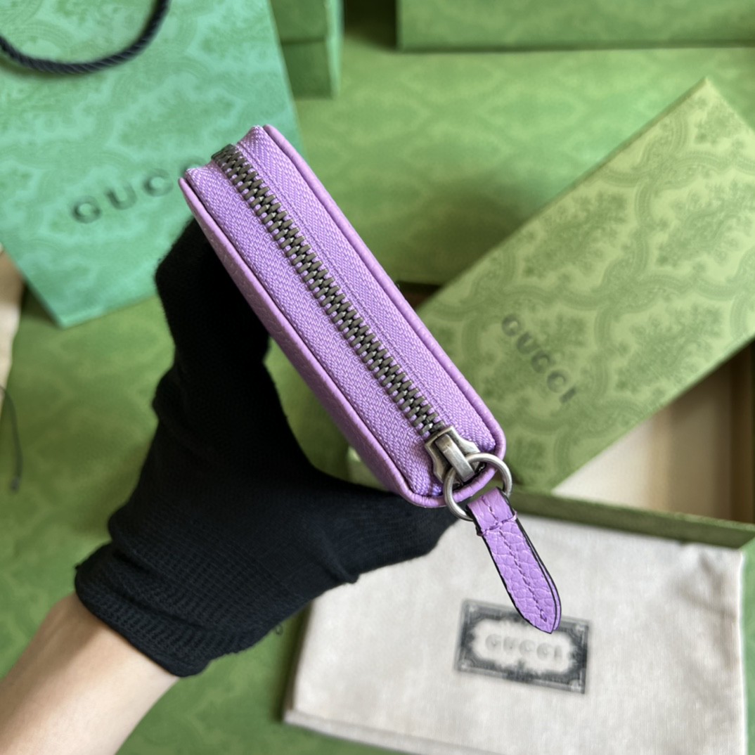 G*u*i leather zip around wallet