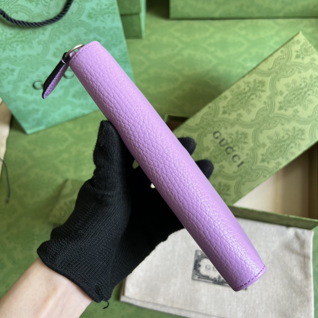 G*u*i leather zip around wallet