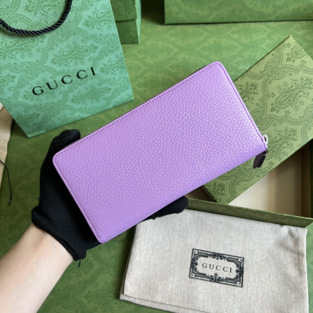 G*u*i leather zip around wallet
