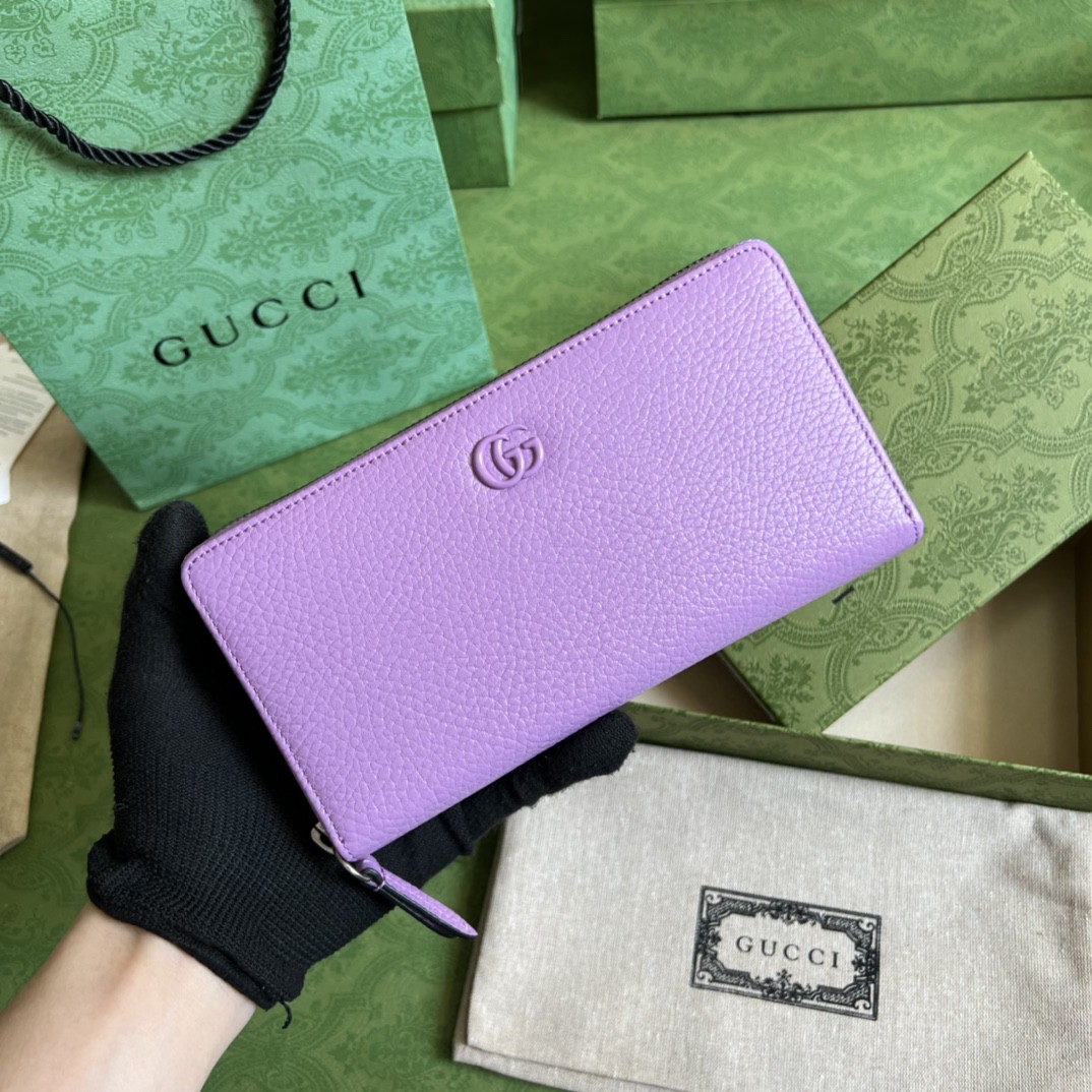 G*u*i leather zip around wallet