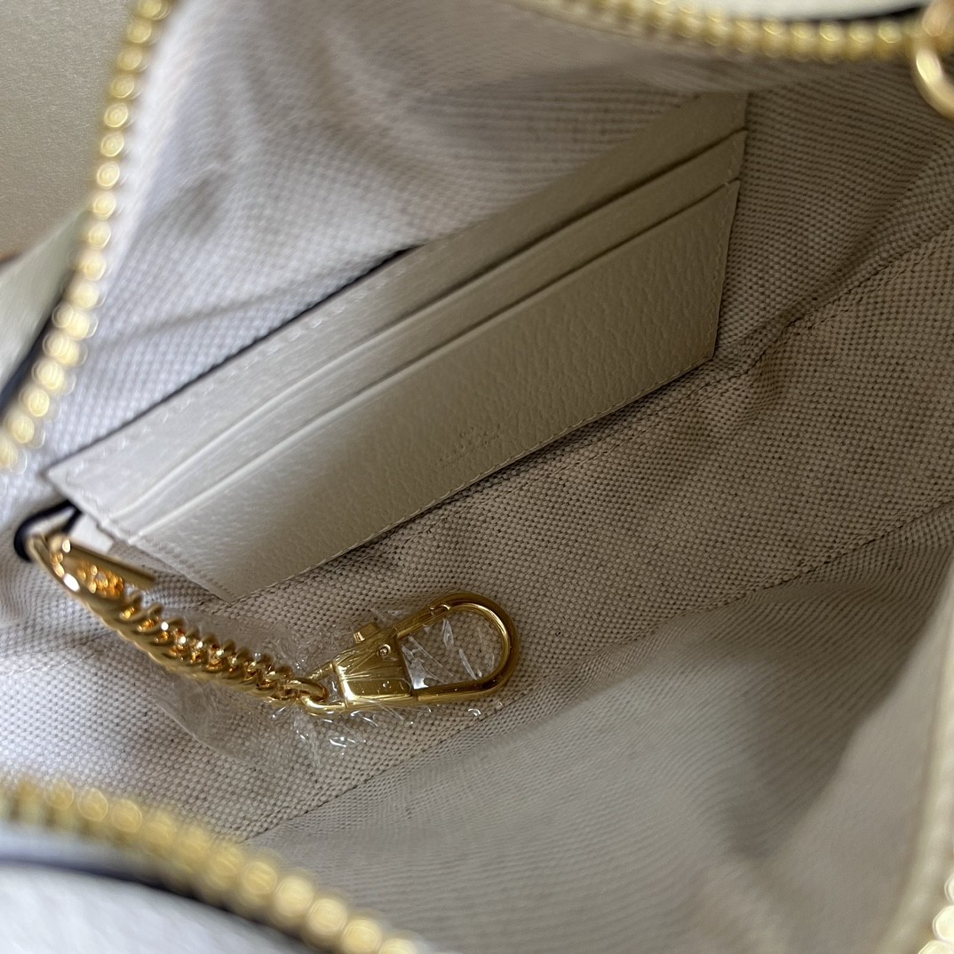 G*u*i half-moon-shaped mini bag with interlocking g