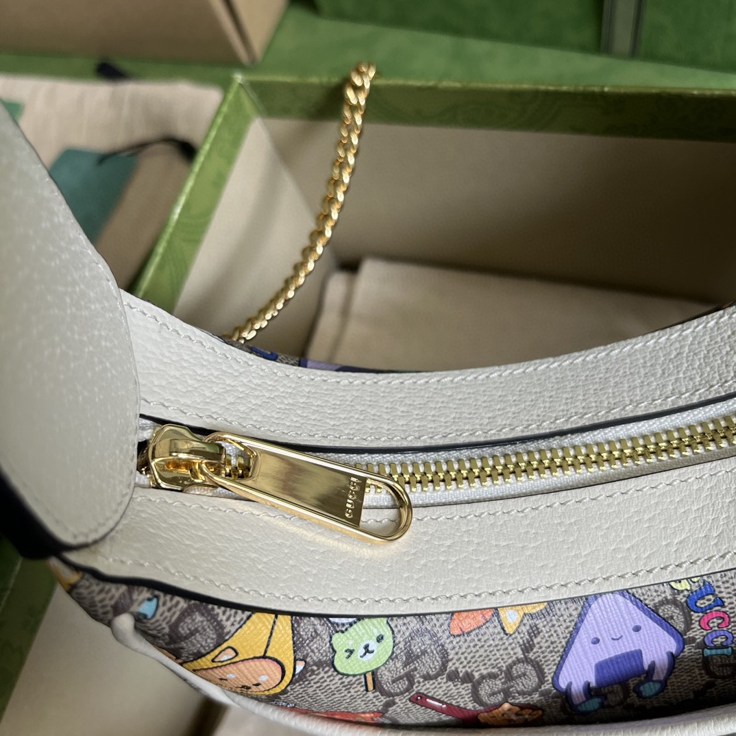G*u*i half-moon-shaped mini bag with interlocking g