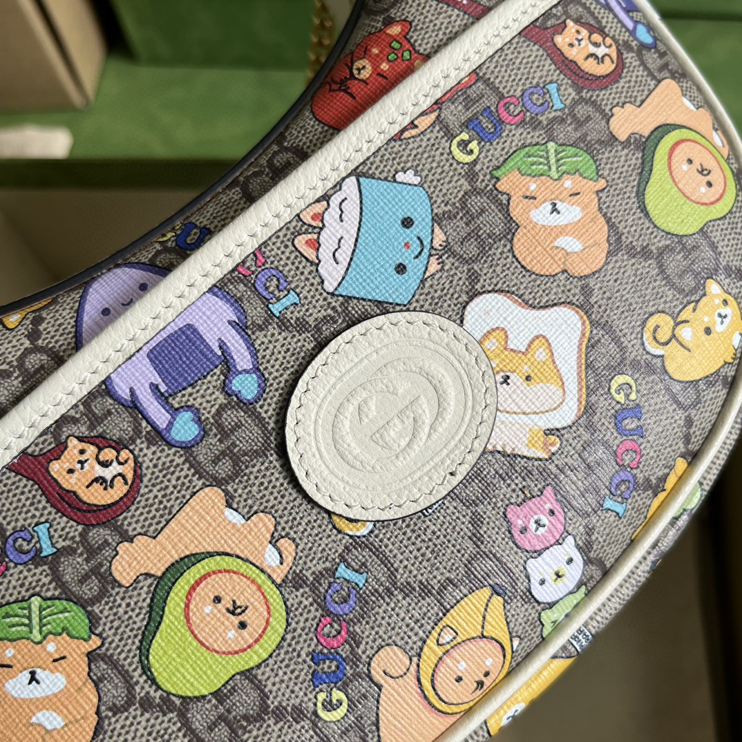 G*u*i half-moon-shaped mini bag with interlocking g