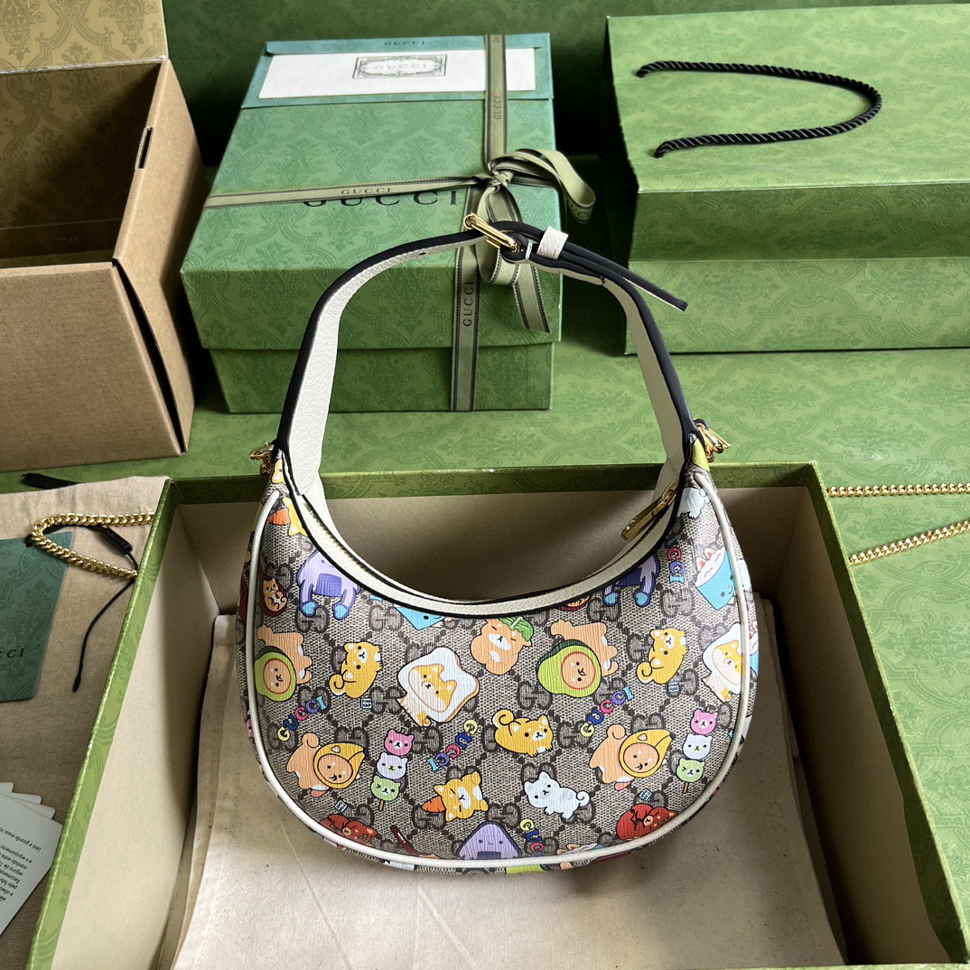 G*u*i half-moon-shaped mini bag with interlocking g