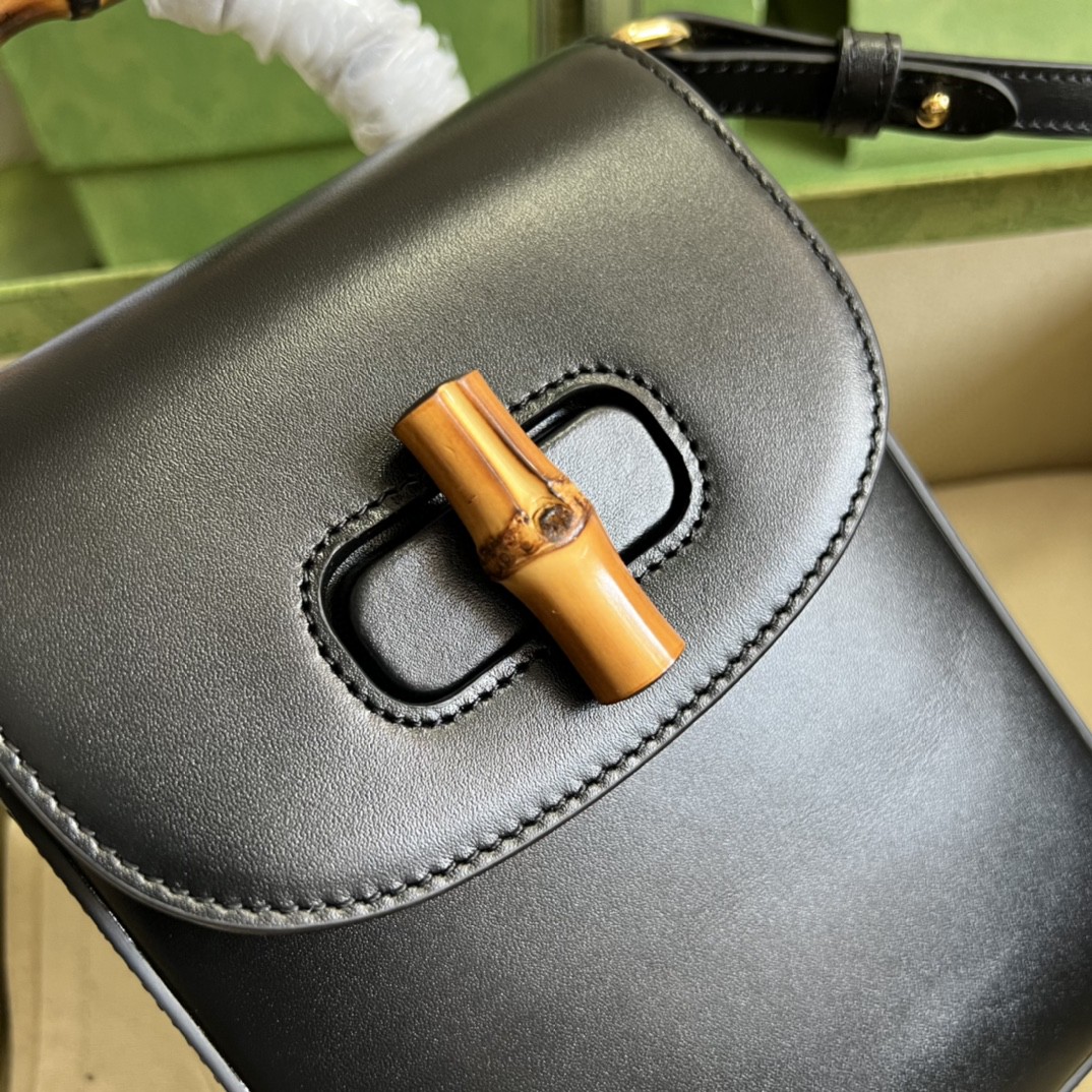 G*u*i bamboo mini handbag