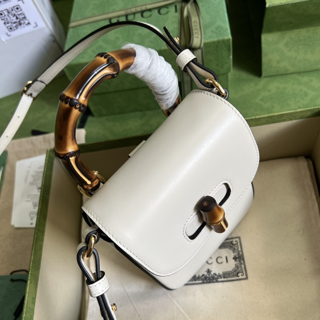 G*u*i bamboo mini handbag