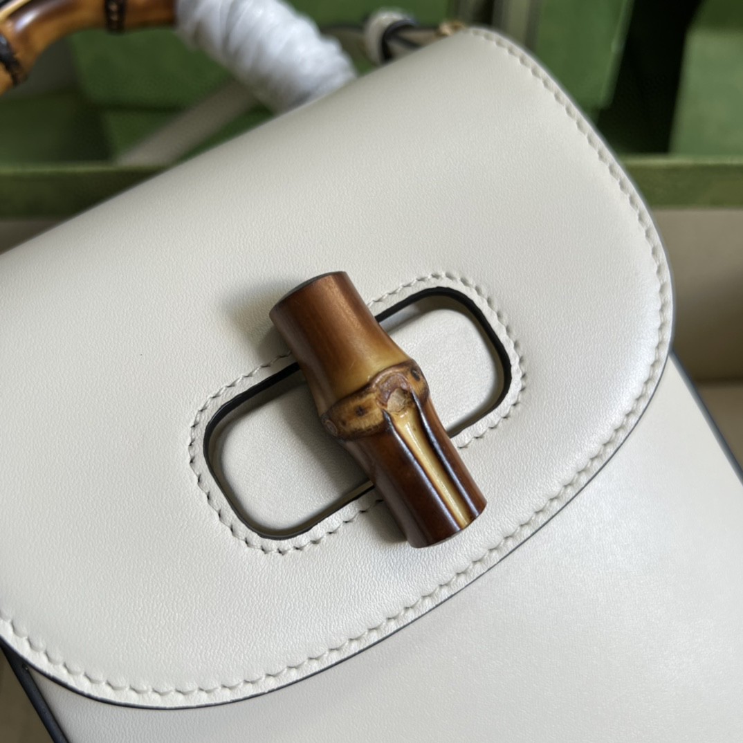 G*u*i bamboo mini handbag