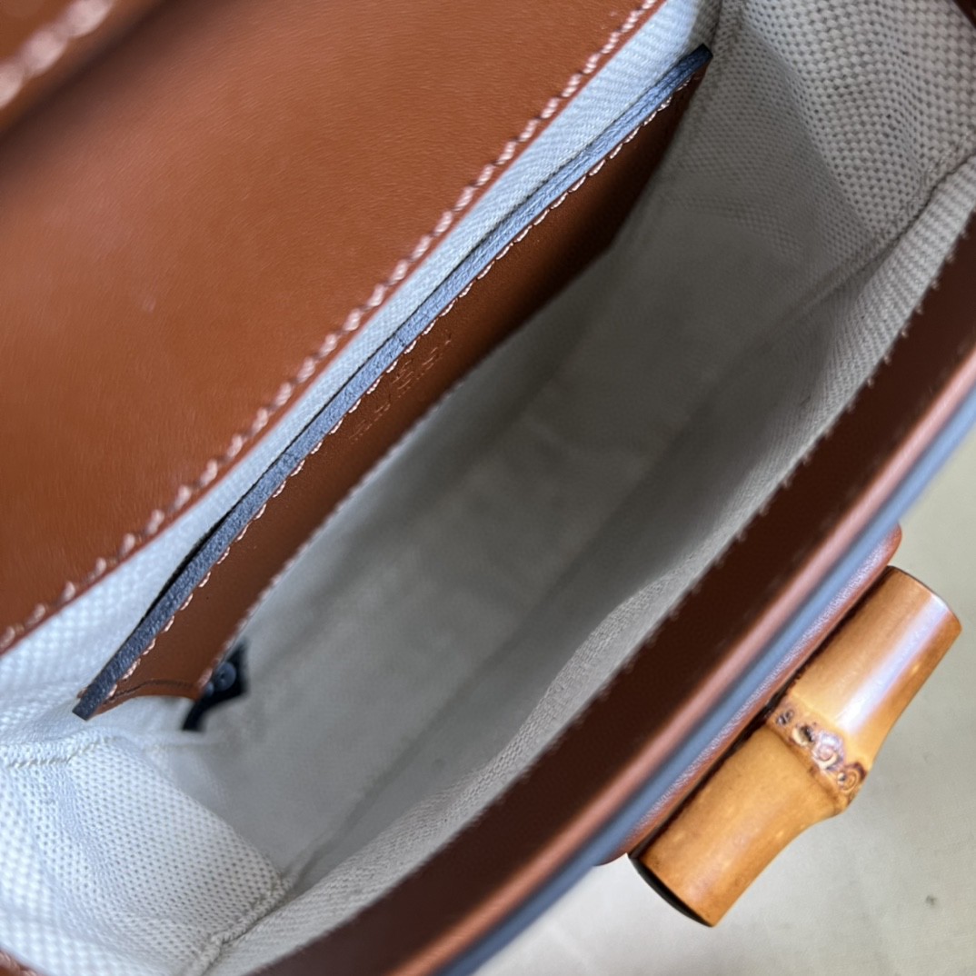 G*u*i bamboo mini handbag