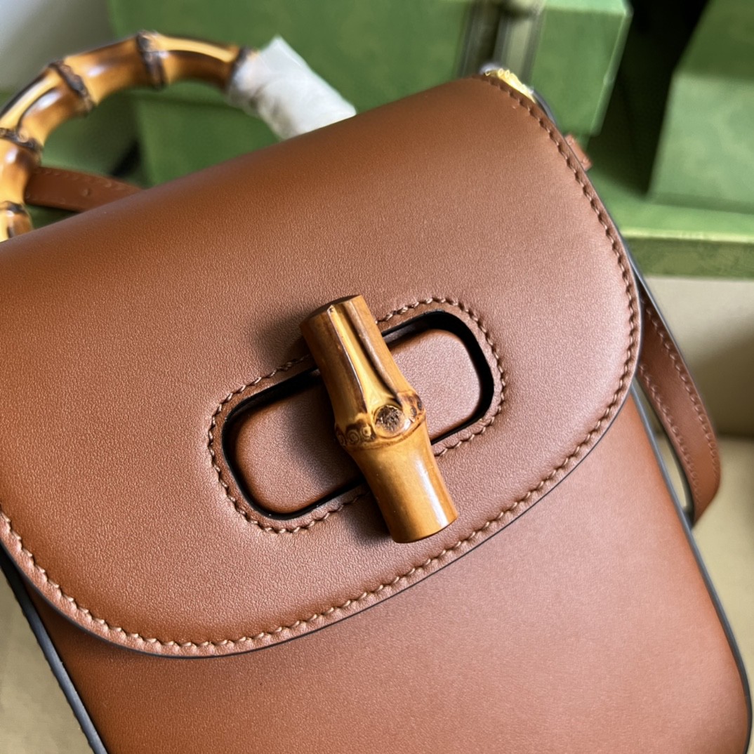 G*u*i bamboo mini handbag