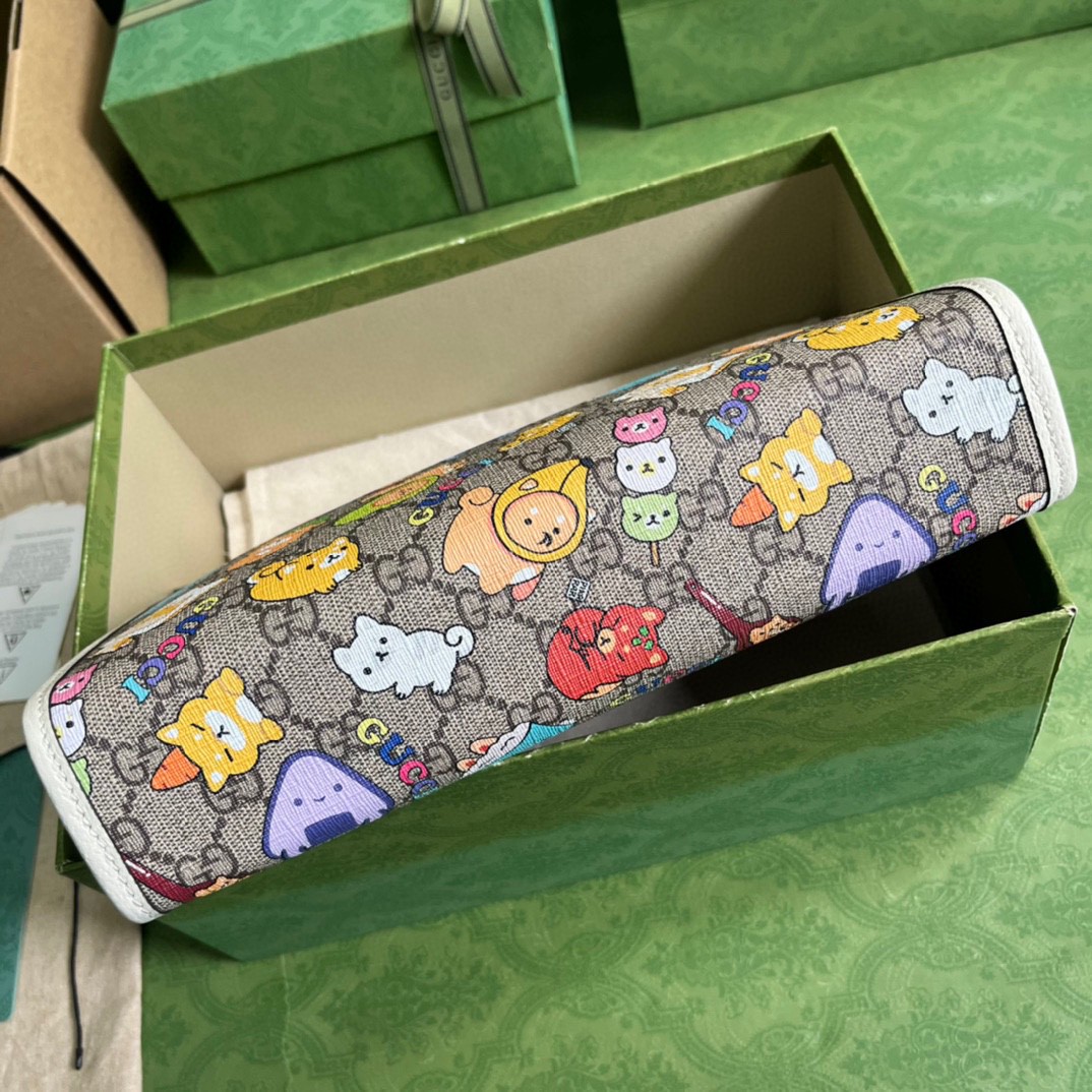 G*u*i animal print toiletry case