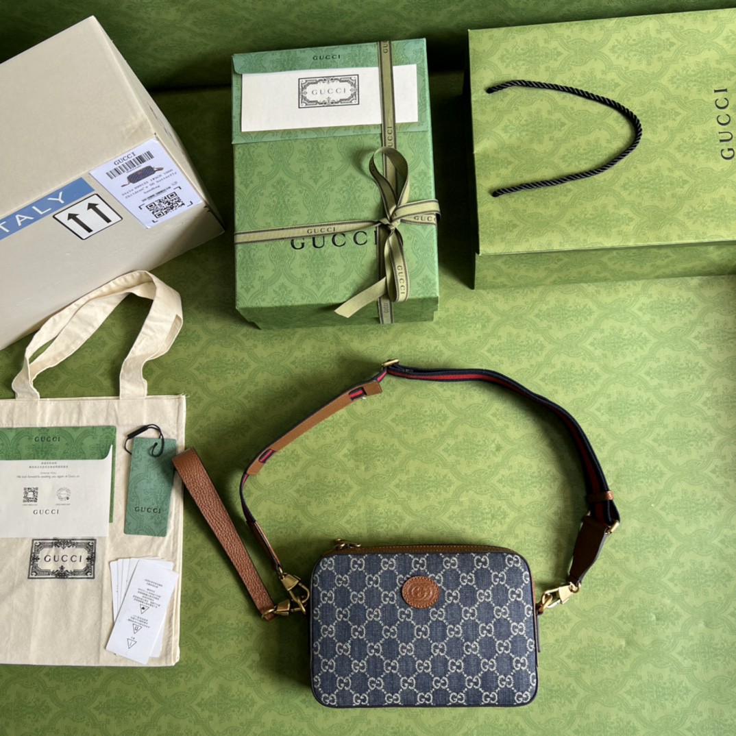 G*u*i camera bag