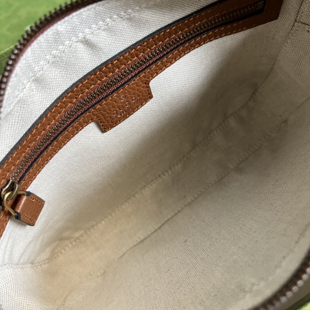 G*u*i camera bag