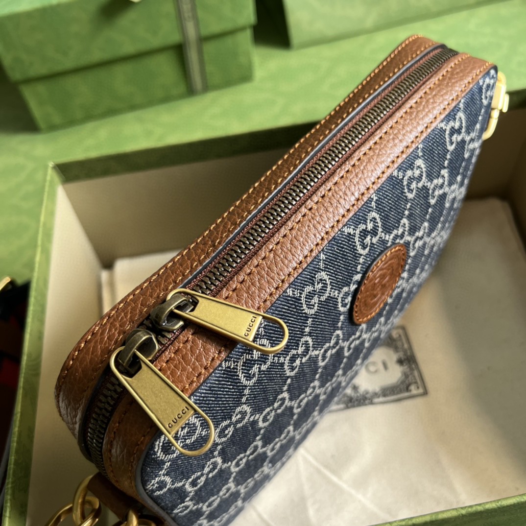 G*u*i camera bag