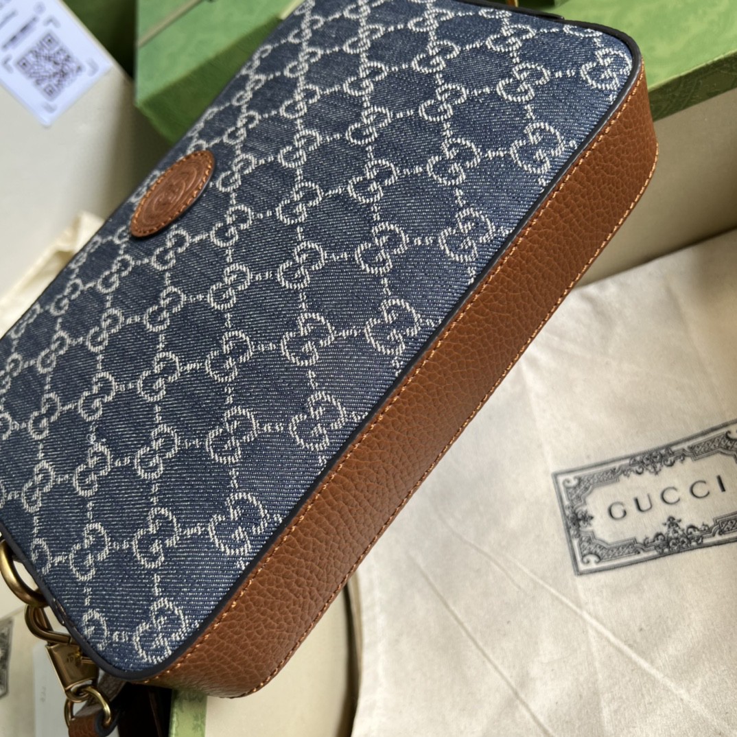 G*u*i camera bag