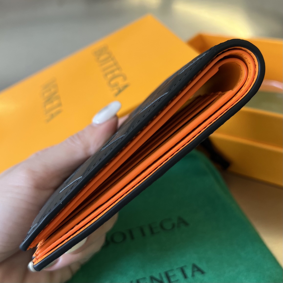 bo*te*ga Ve*ne*ta intrecciato bi-fold wallet