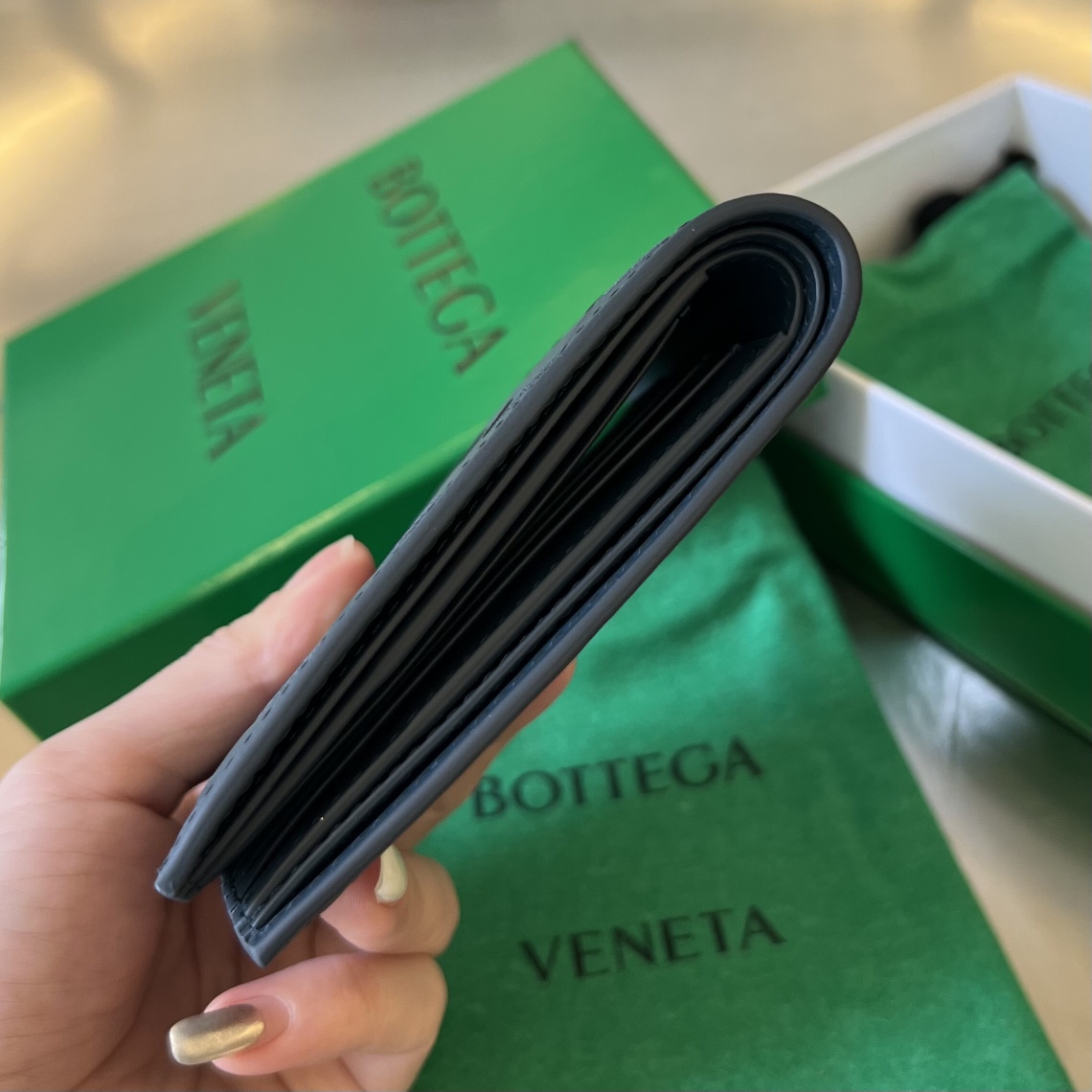 bo*te*ga Ve*ne*ta intrecciato bi-fold wallet