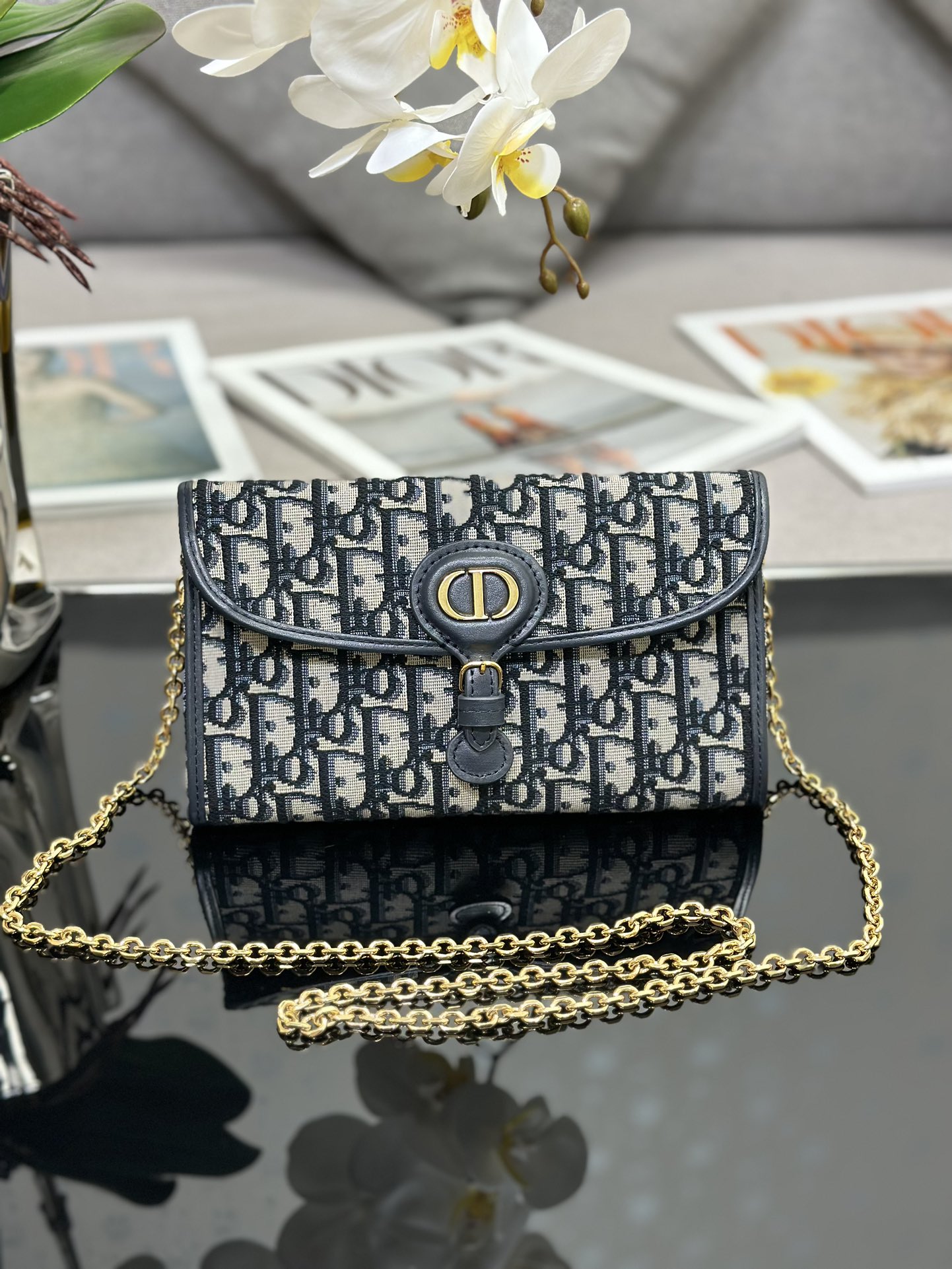 D*or bobby east-west pouch with chain