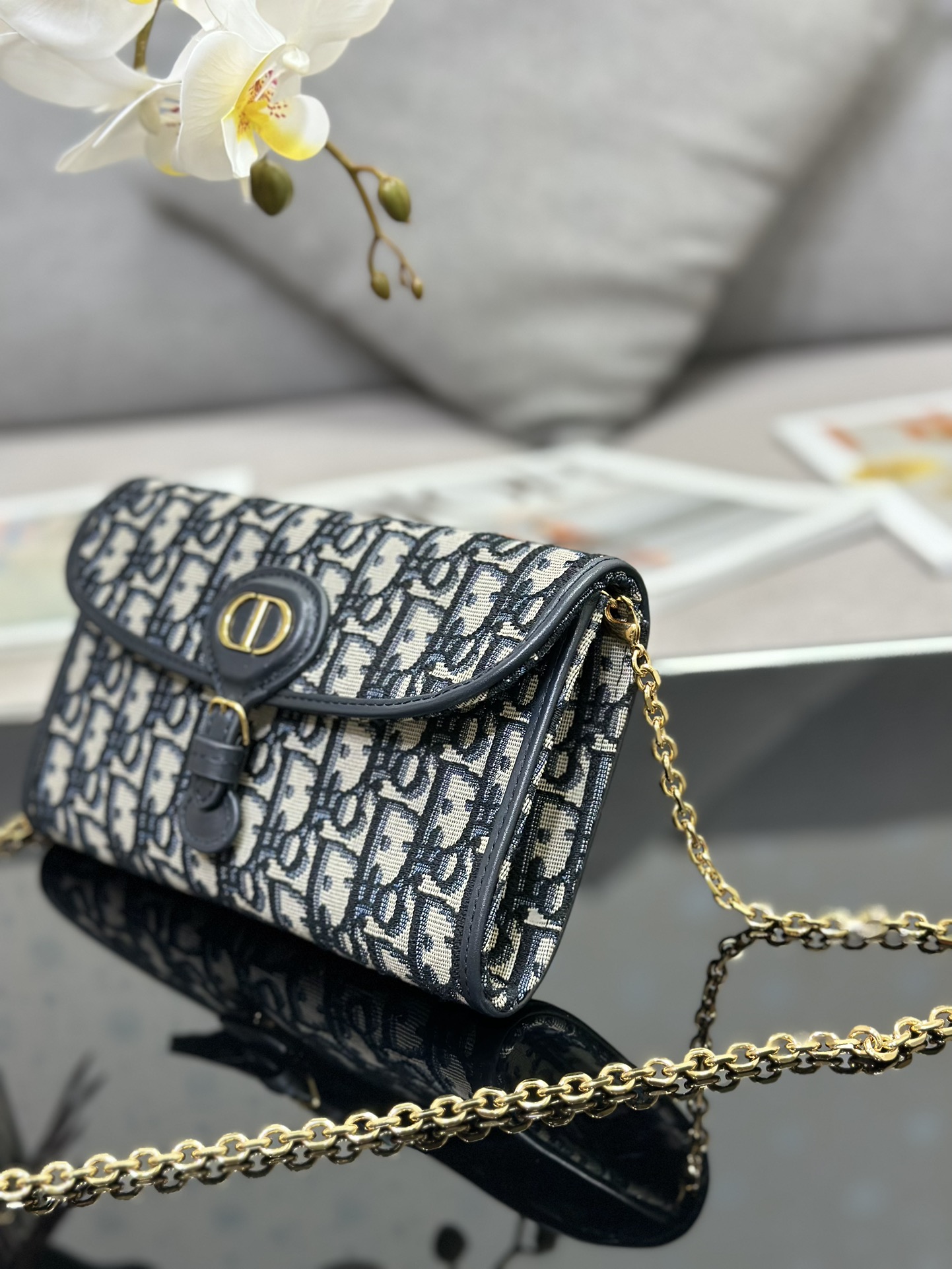D*or bobby east-west pouch with chain