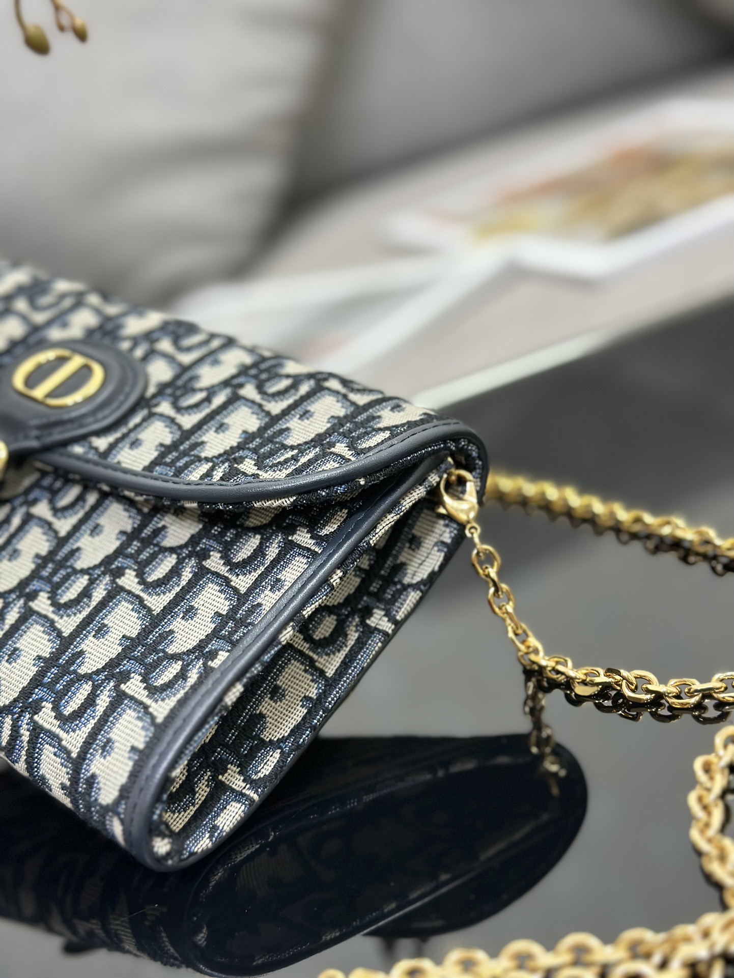 D*or bobby east-west pouch with chain
