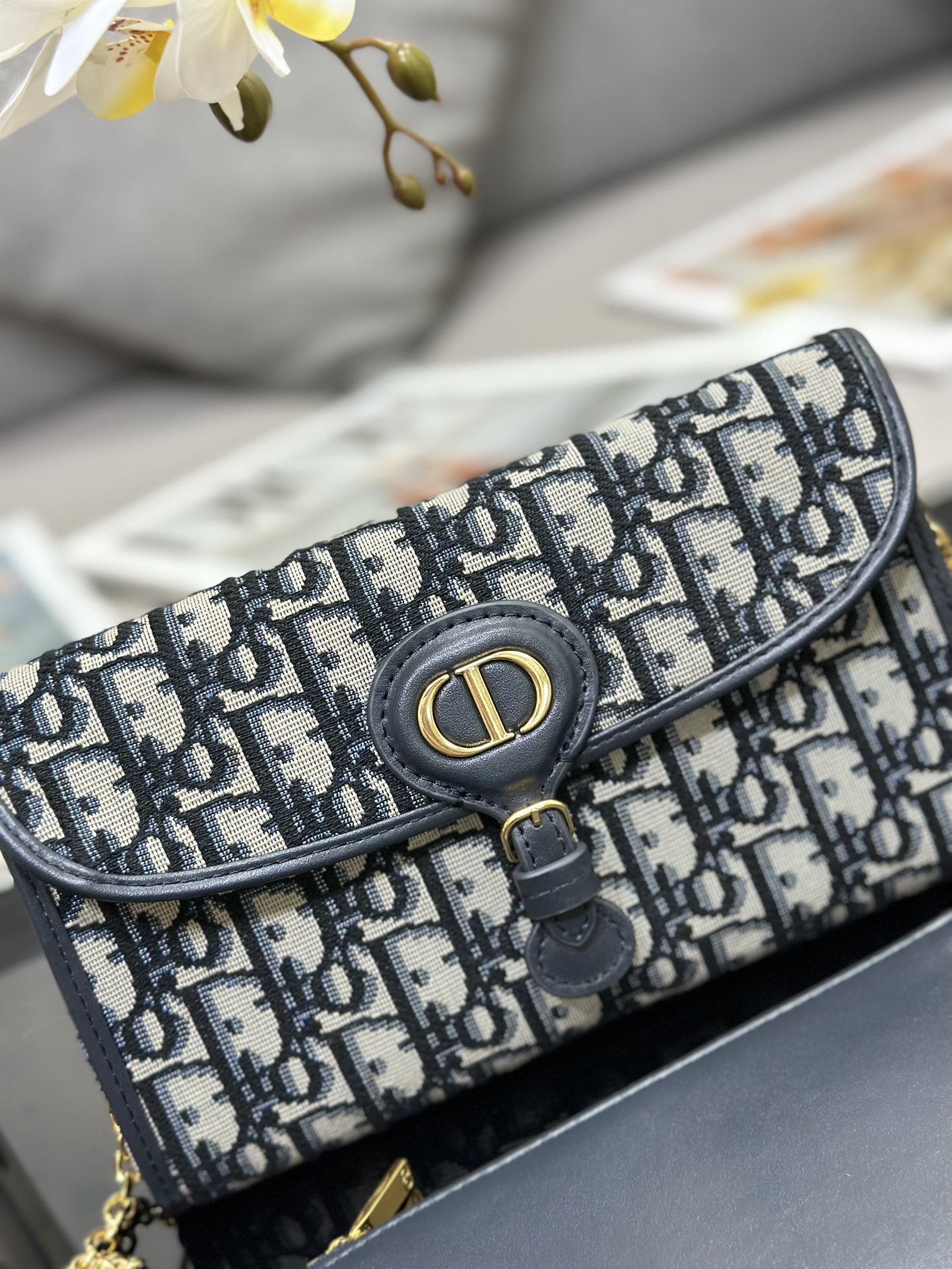 D*or bobby east-west pouch with chain
