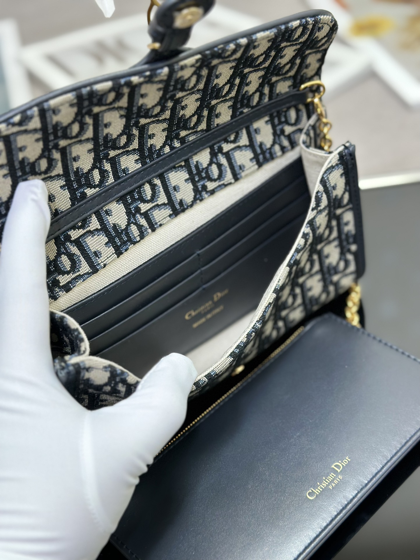 D*or bobby east-west pouch with chain