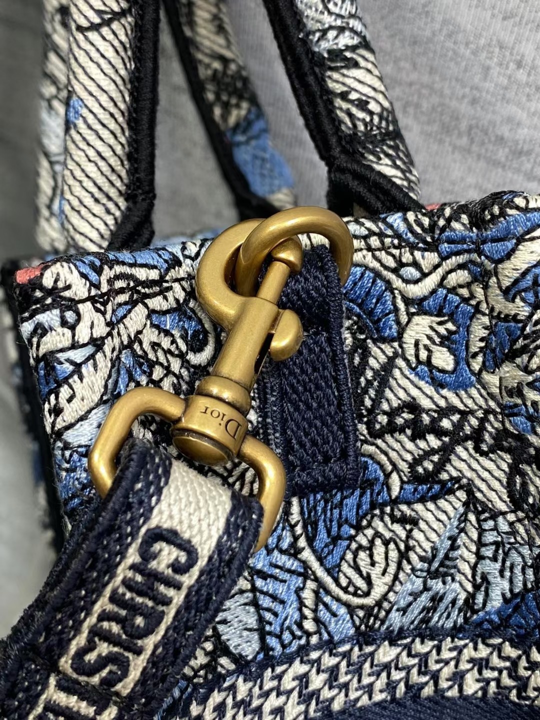 mini D*or book tote phone bag