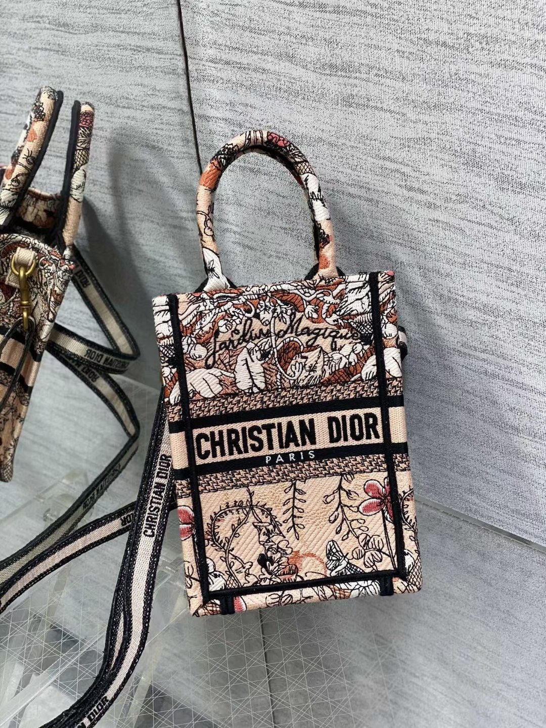 mini D*or book tote phone bag