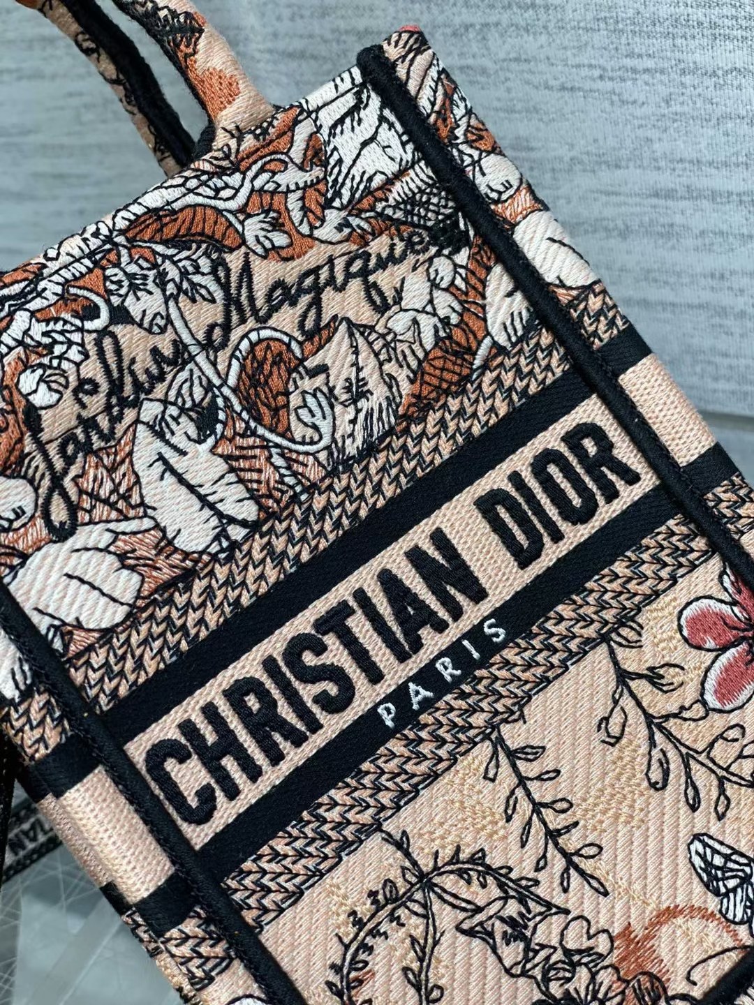 mini D*or book tote phone bag