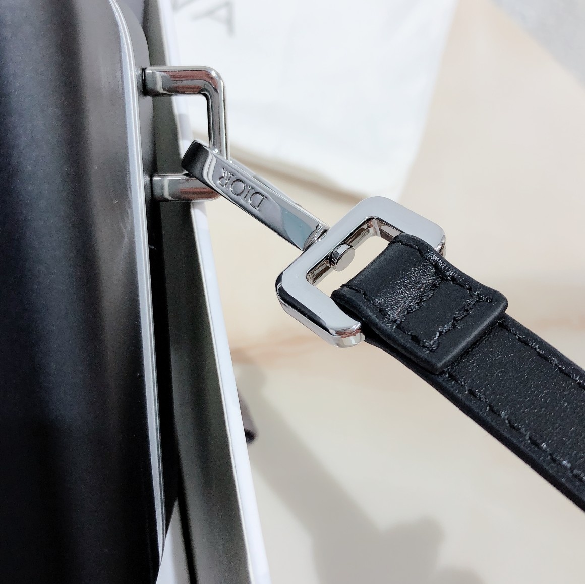 D*or and rimowa black trunk