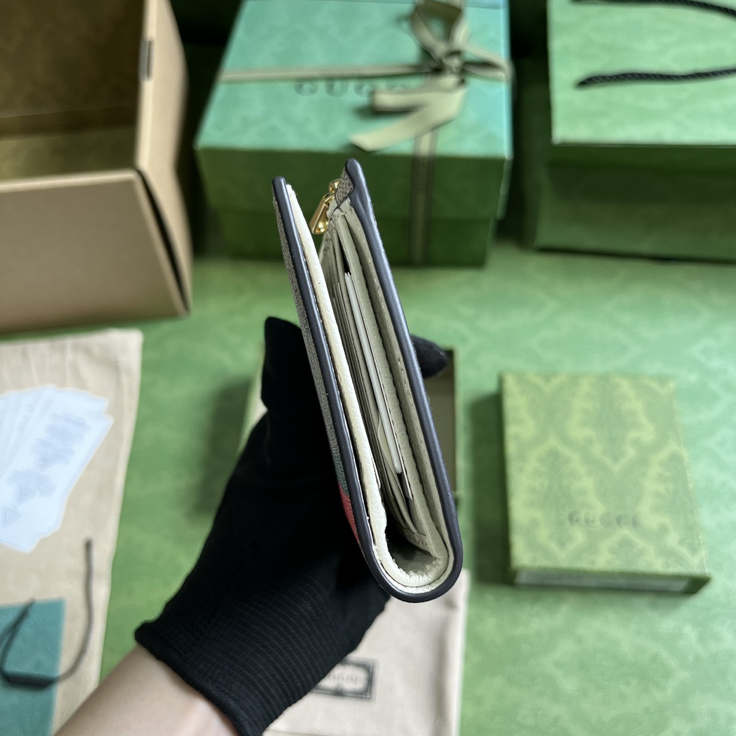 G*u*i animal print long wallet