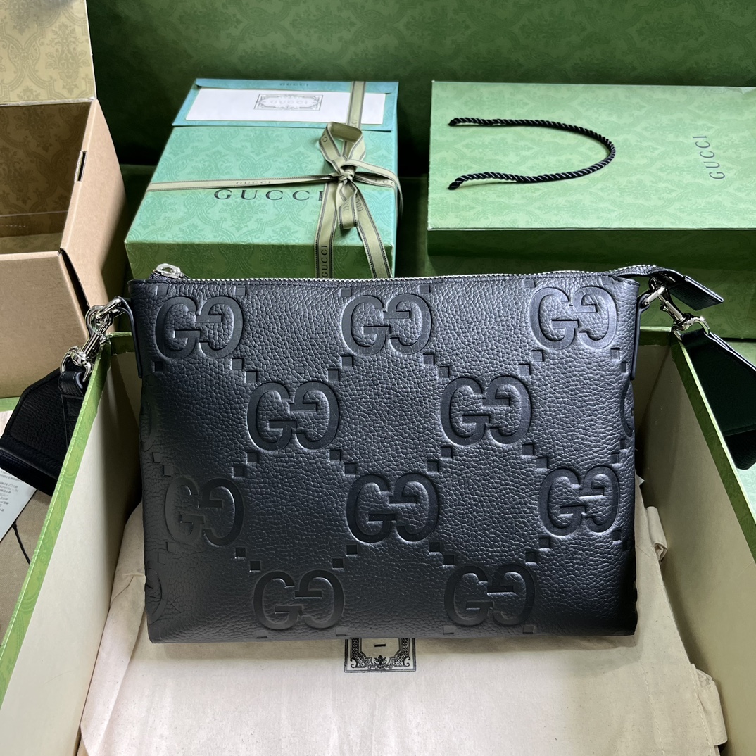 G*u*i gg embossed medium messenger bag