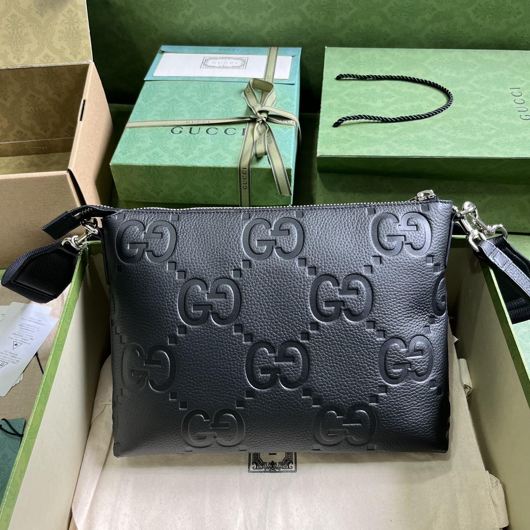 G*u*i gg embossed medium messenger bag