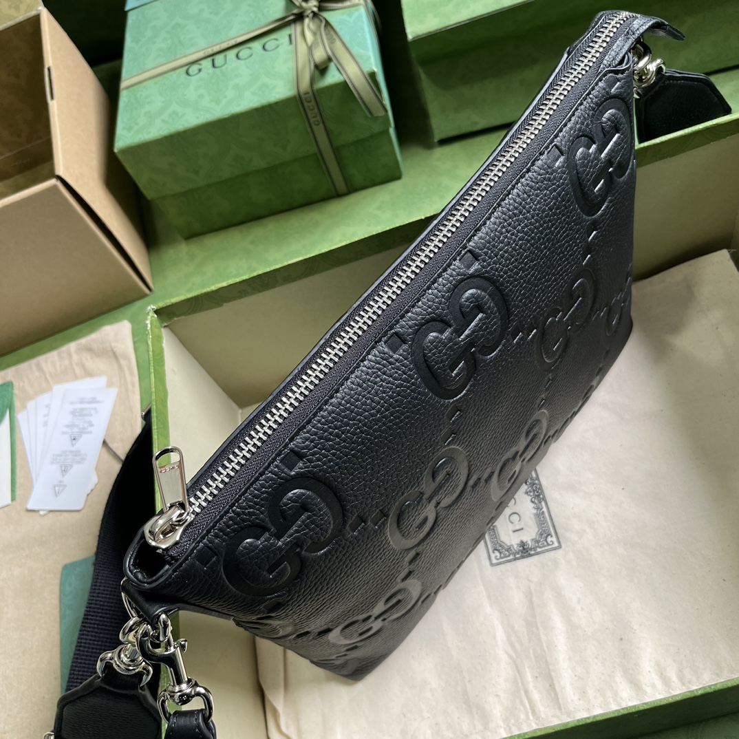 G*u*i gg embossed medium messenger bag