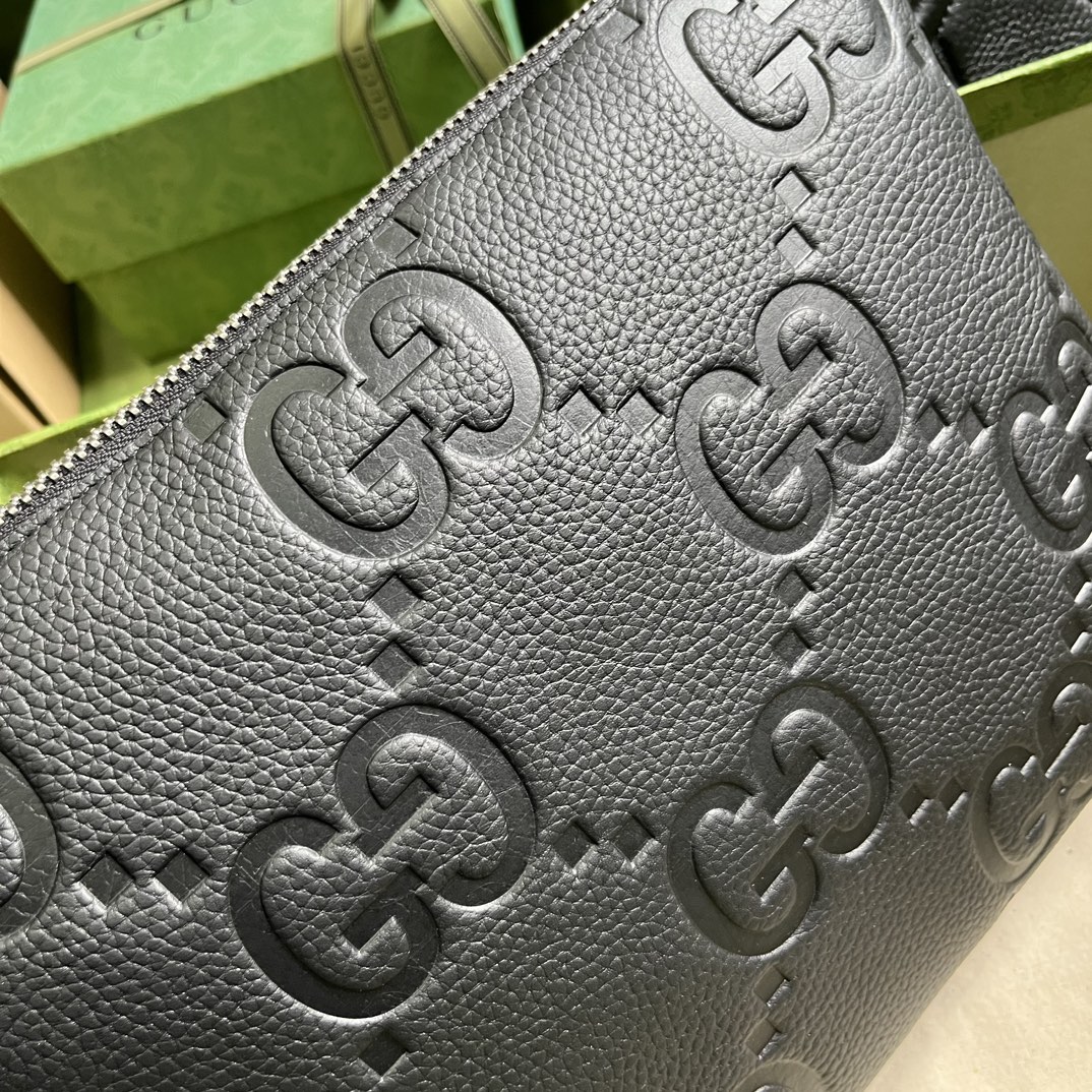 G*u*i gg embossed medium messenger bag