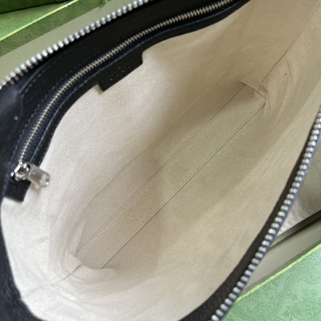G*u*i gg embossed medium messenger bag
