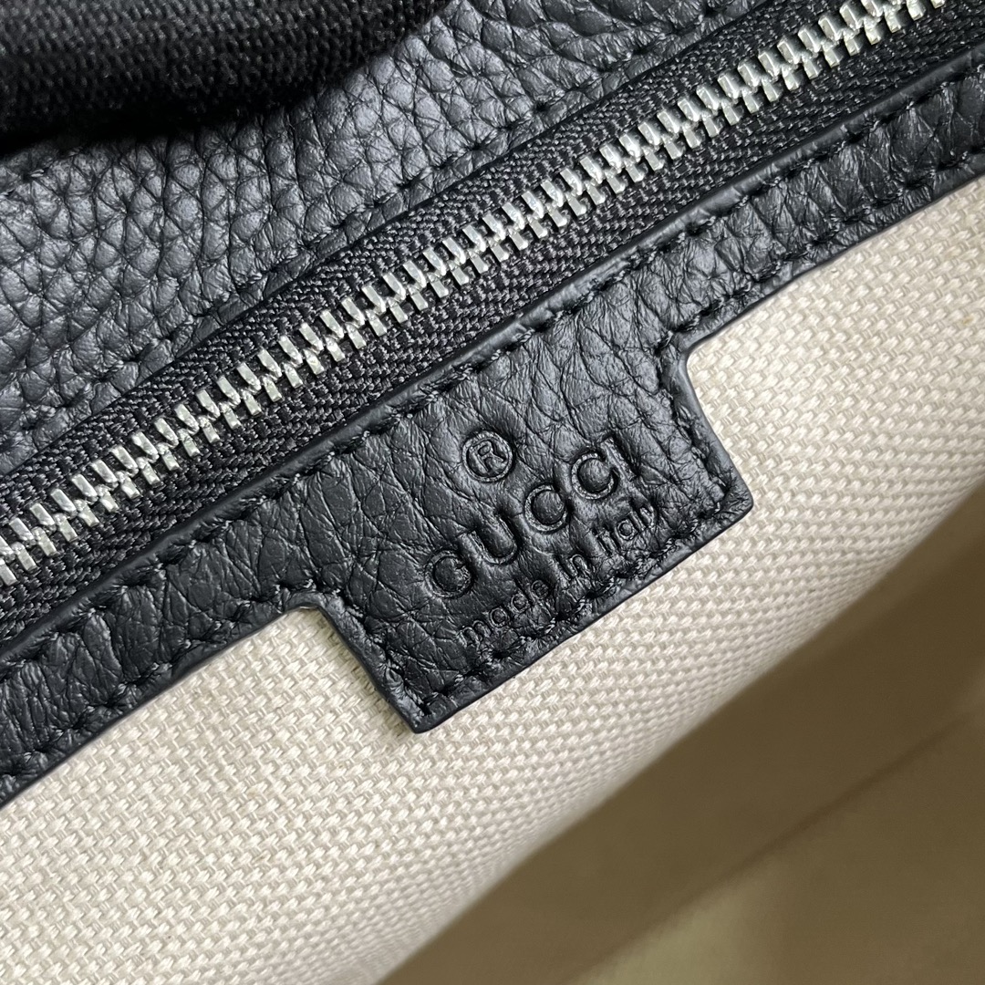G*u*i gg embossed medium messenger bag