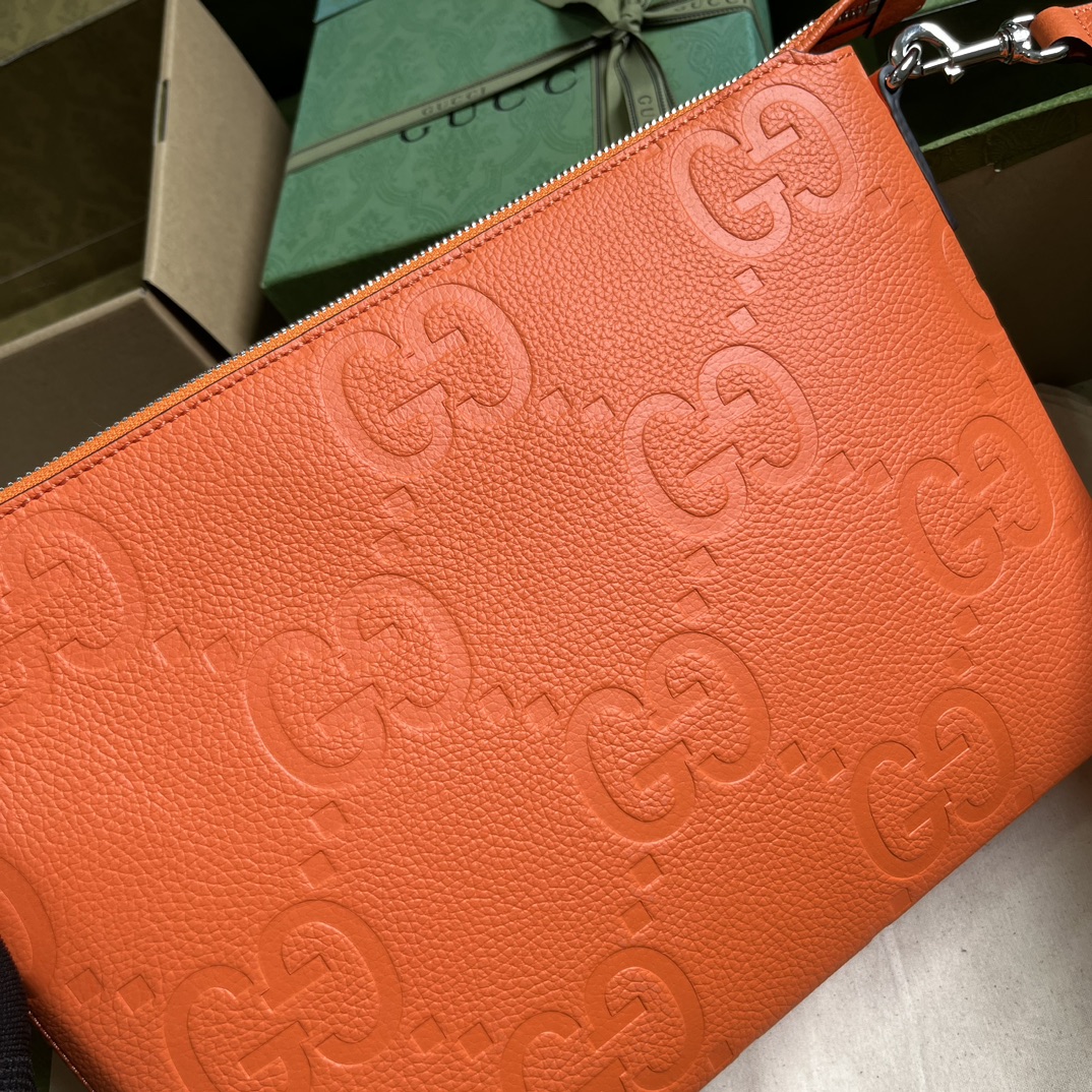 G*u*i gg embossed medium messenger bag