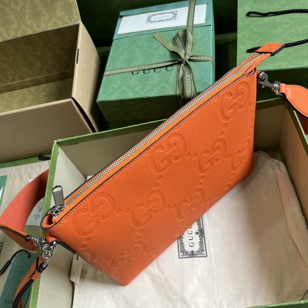 G*u*i gg embossed medium messenger bag