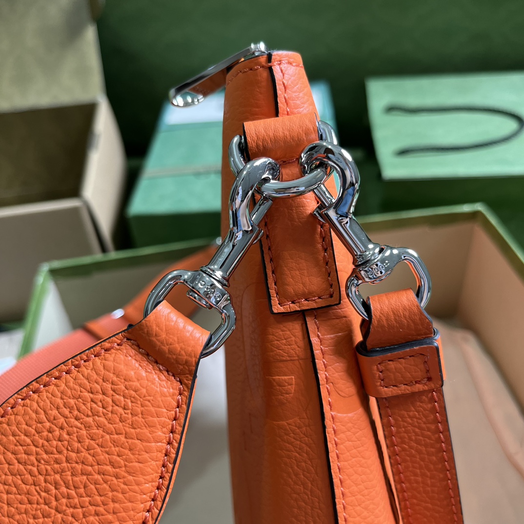 G*u*i gg embossed medium messenger bag