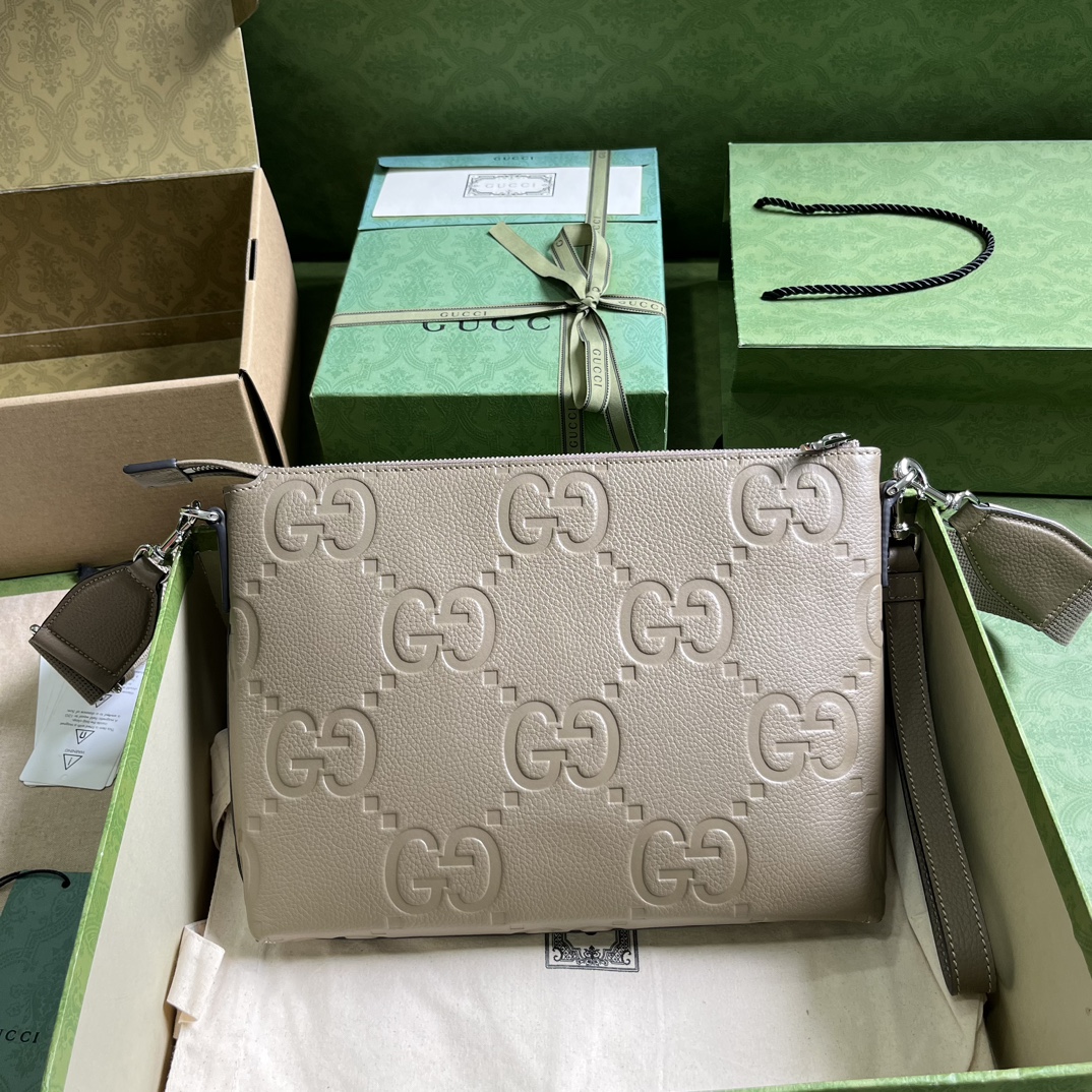 G*u*i gg embossed medium messenger bag