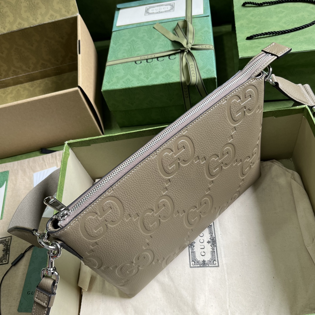 G*u*i gg embossed medium messenger bag