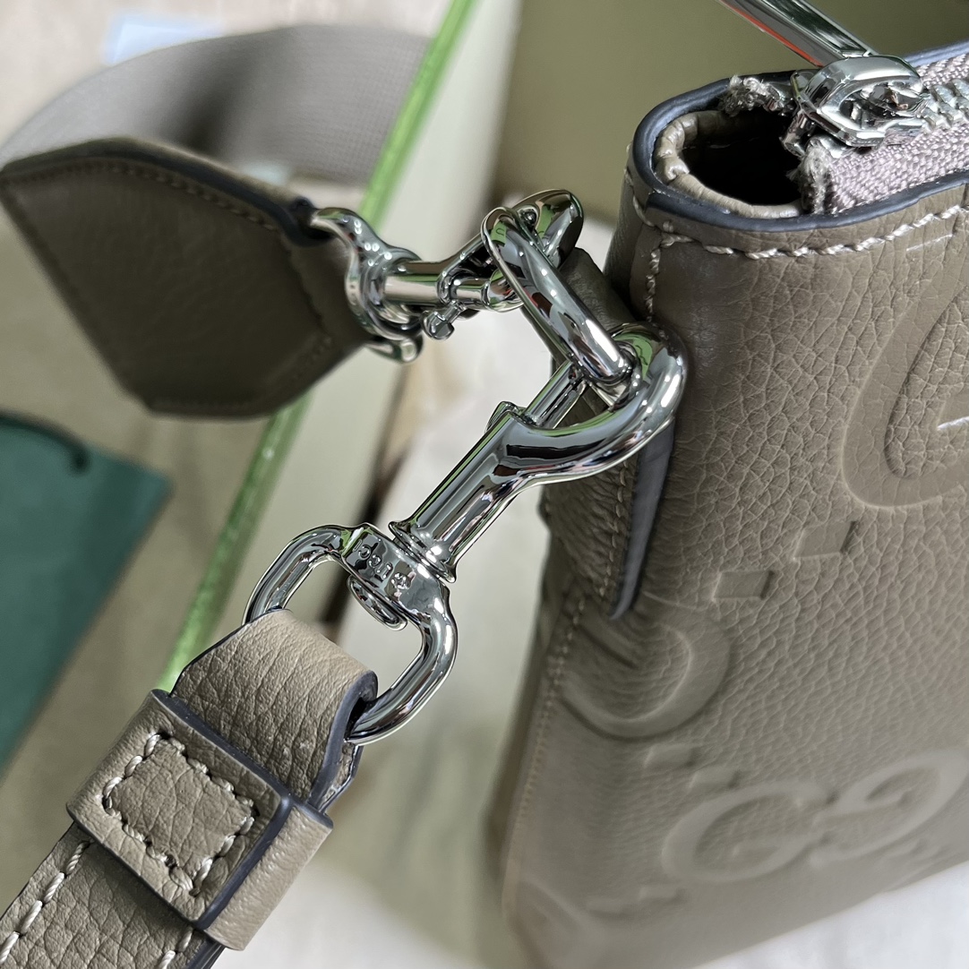 G*u*i gg embossed medium messenger bag