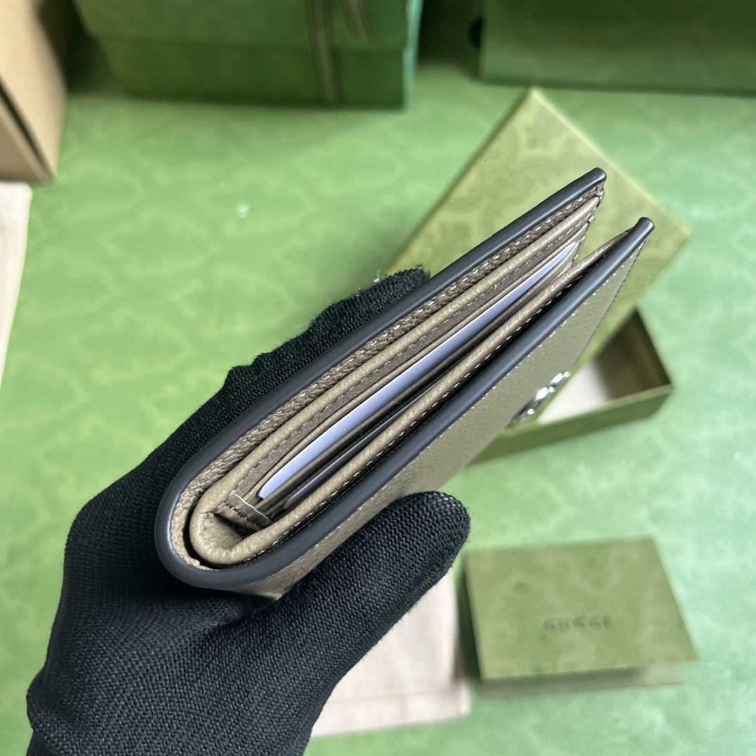 G*u*i gg marmont leather bi-fold wallet