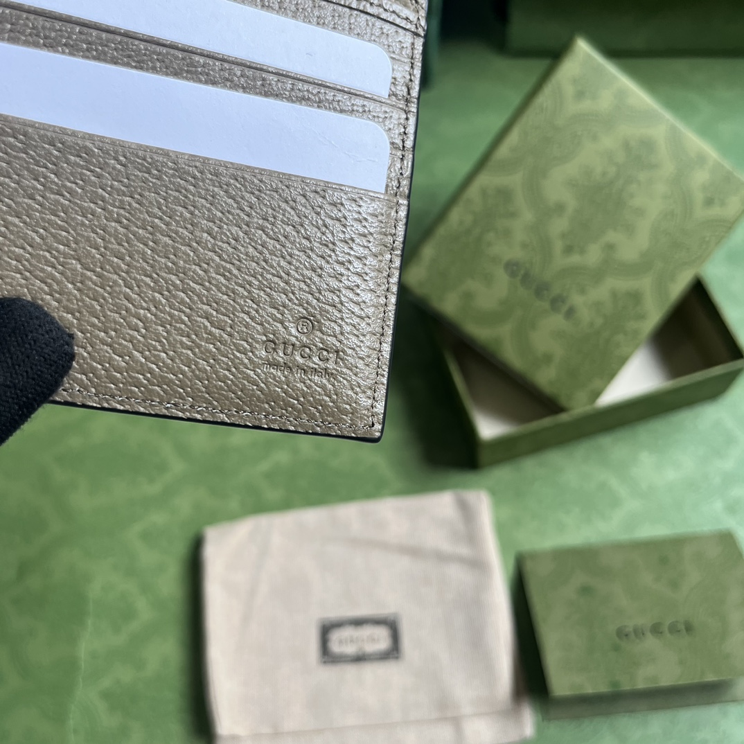 G*u*i gg marmont leather bi-fold wallet
