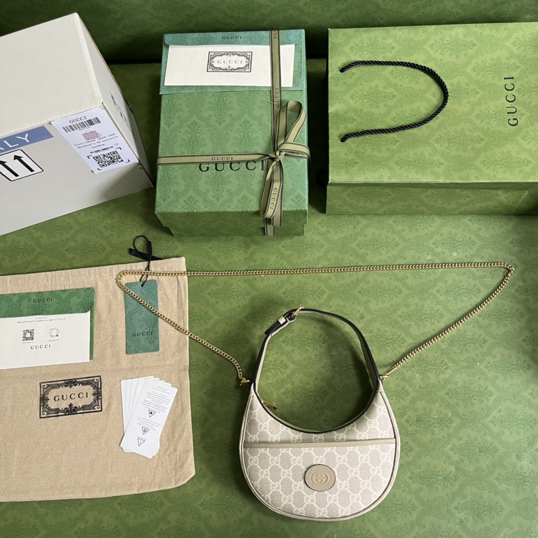 G*u*i half-moon-shaped mini bag with interlocking g