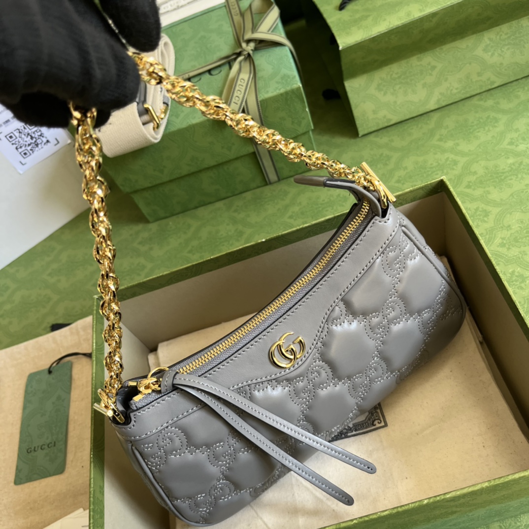 G*u*i matelassé handbag
