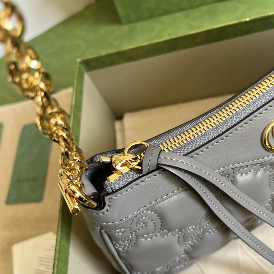 G*u*i matelassé handbag